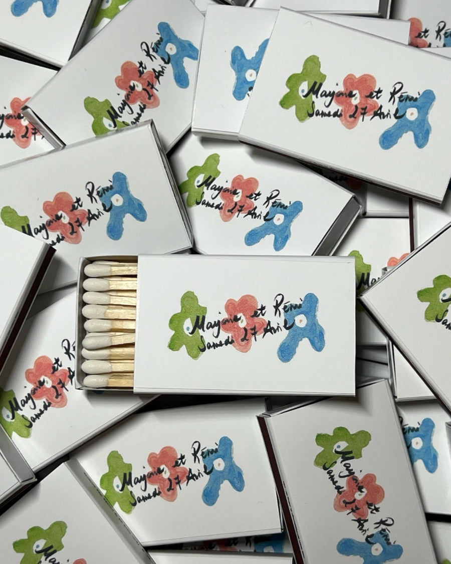 Wedding names and date with water colour inspired artwork. Custom matchboxes