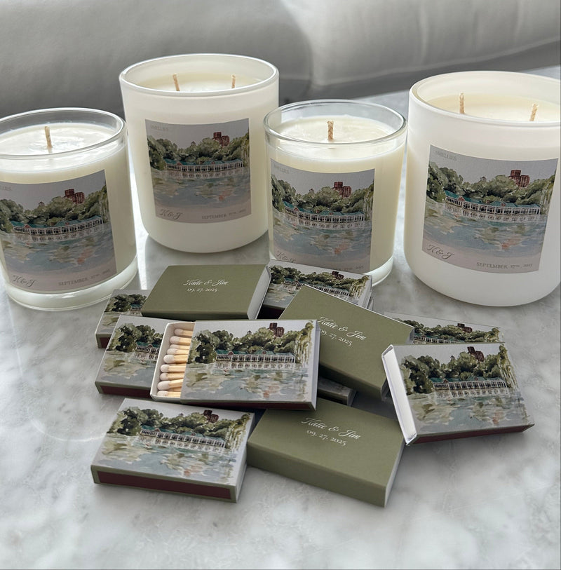 Set of candles and matchboxes on a marble surface for wedding gift